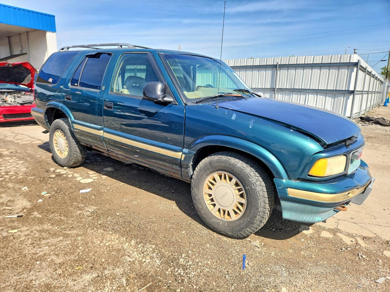 1997 GMC Jimmy VIN 1GKDT13W2V2563131 photo 4