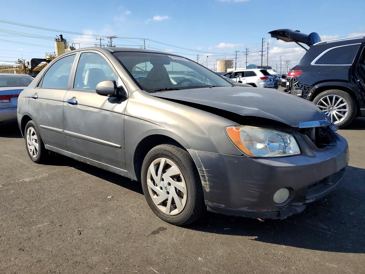 2005 Kia Spectra VIN KNAFE122355204590 photo 4