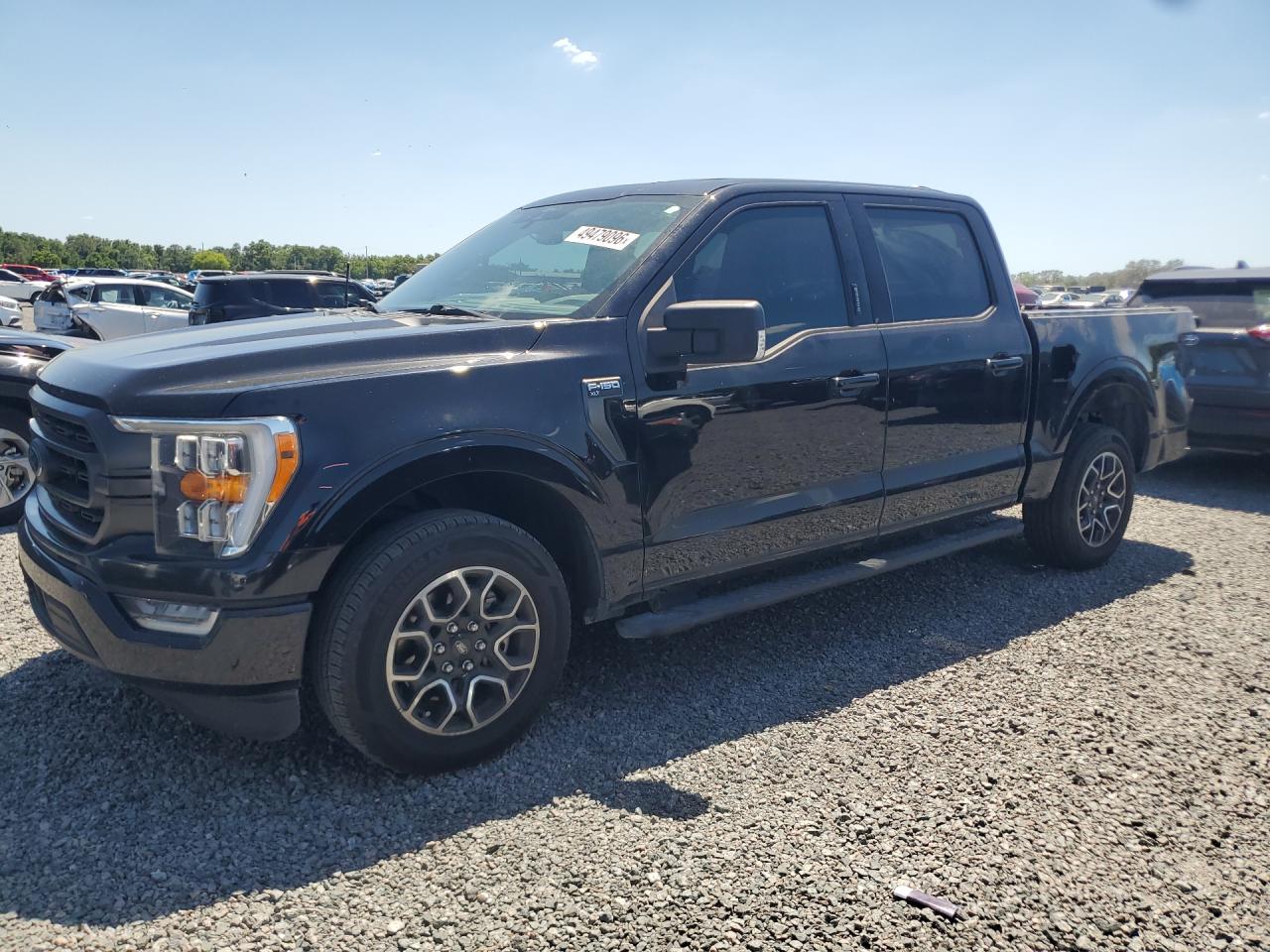 2022 Ford F150 VIN 1FTEW1CP0NFA77989 photo 1