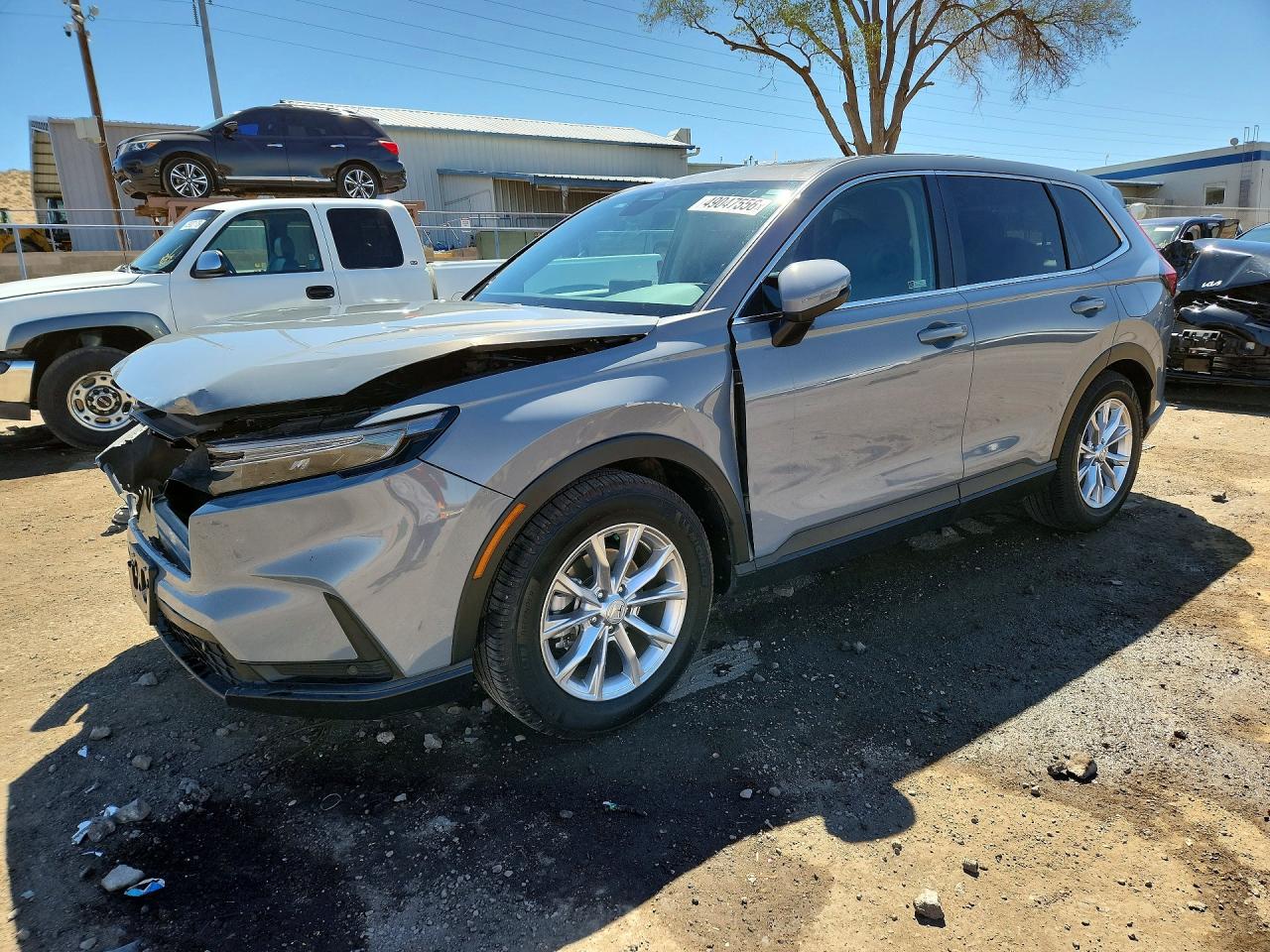2023 Honda Crv VIN 2HKRS3H7XPH306768 photo 1