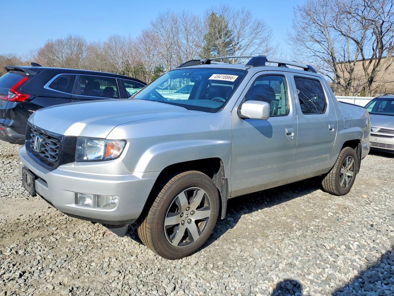 2014 Honda Ridgeline VIN 5FPYK1F64EB014501 photo 1