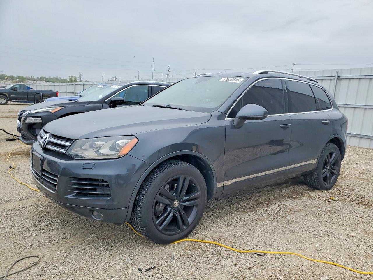 2013 Volkswagen Touareg VIN WVGEP9BP9DD012836 photo 1