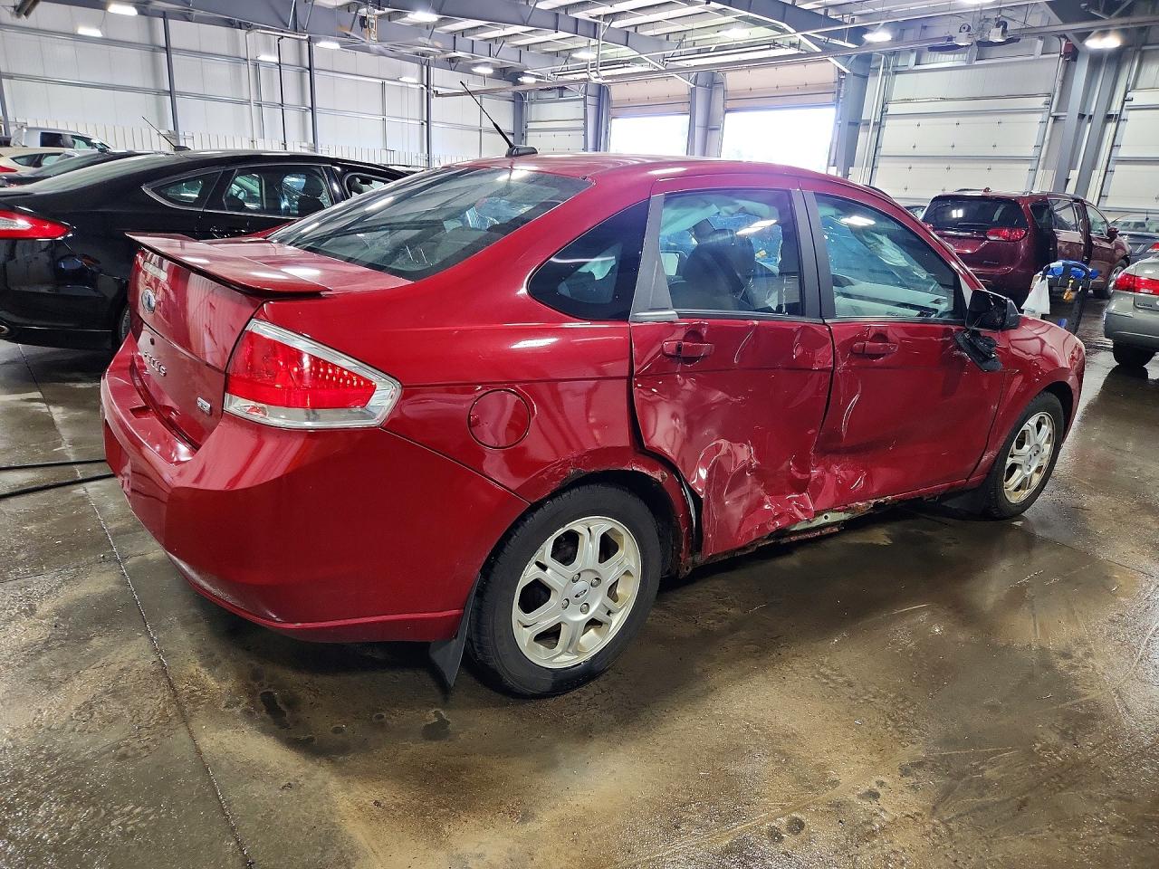 2009 Ford Focus VIN 1FAHP36N79W263847 photo 3