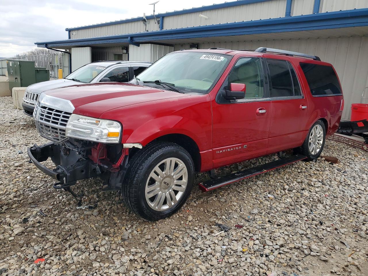 2013 Lincoln Navigator VIN 5LMJJ3J56DEL07851 photo 1