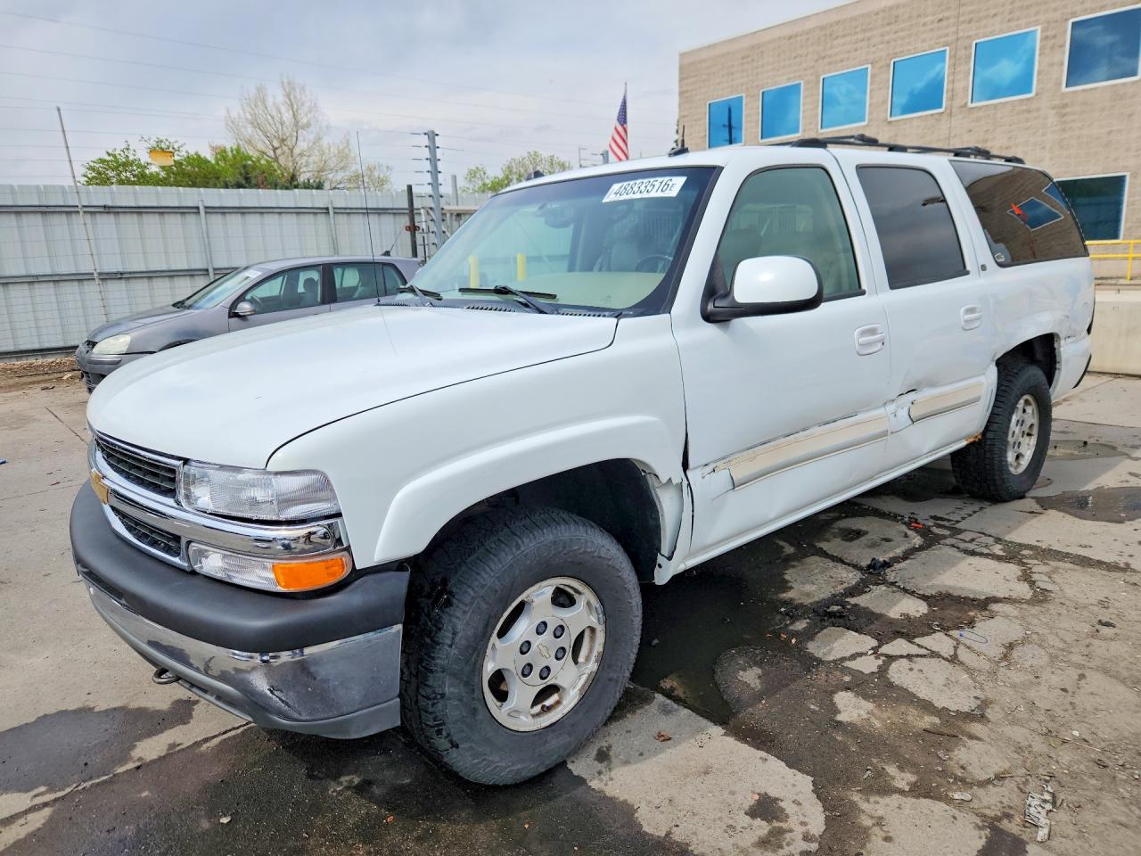 2004 Chevrolet Suburban VIN 1GNFK16TX4J204484 photo 1