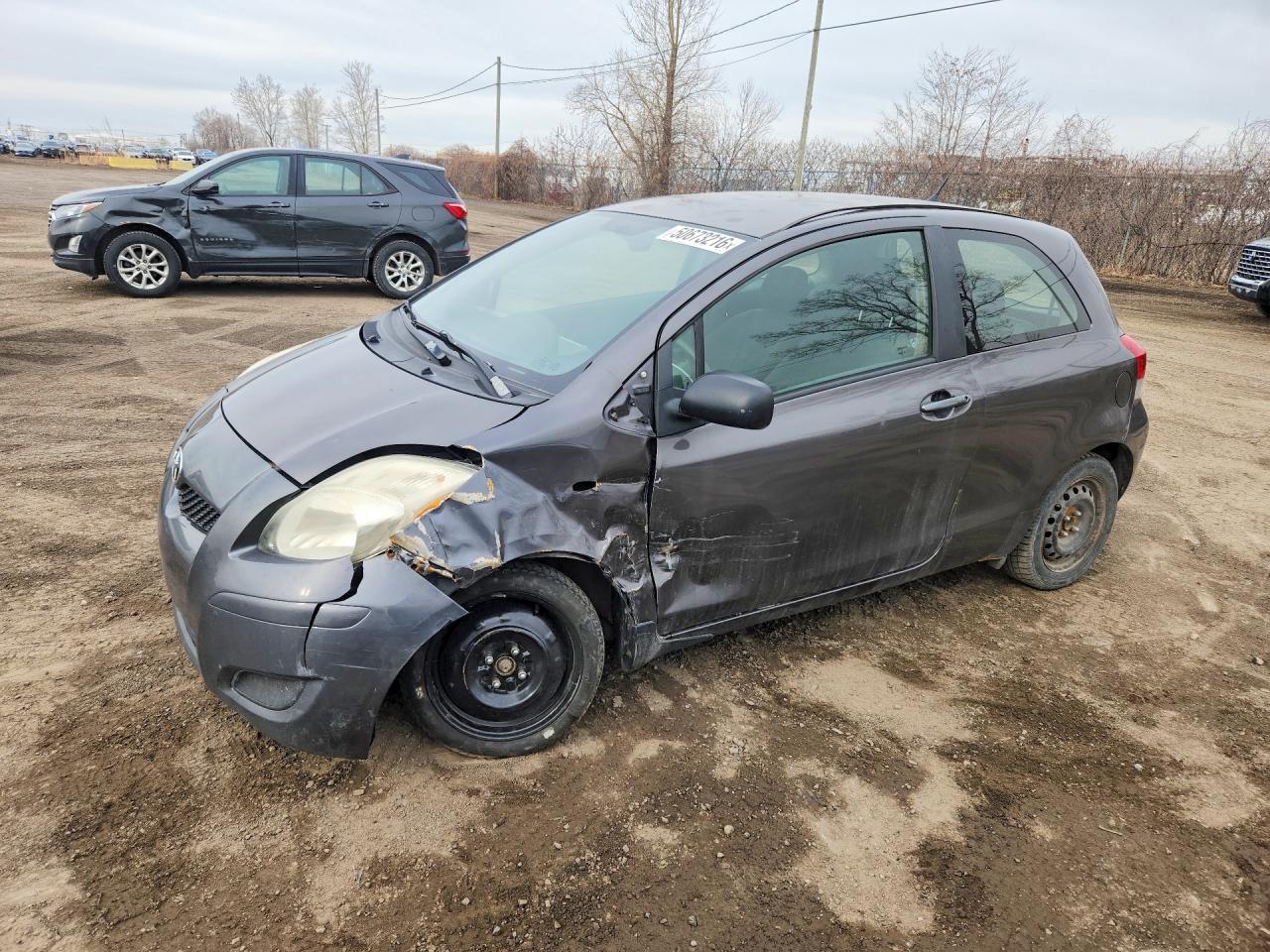2011 Toyota Yaris VIN JTDJT4K33B5337603 photo 1
