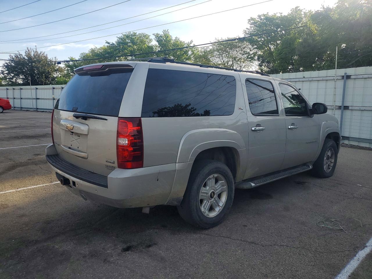 2009 Chevrolet Suburban VIN 1GNFK26309R135433 photo 3