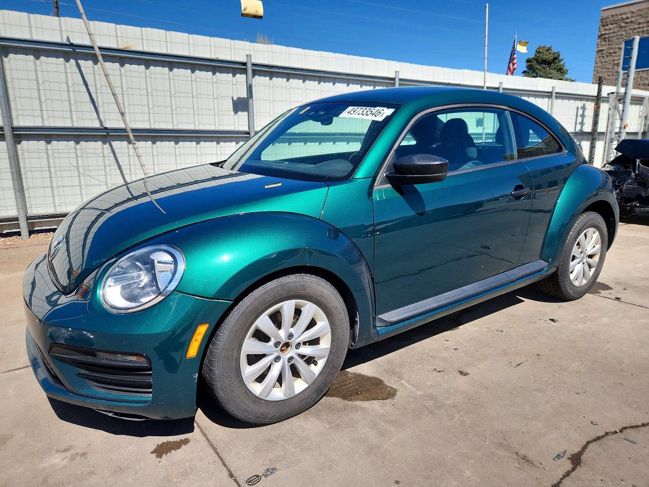 2017 Volkswagen Beetle VIN 3VWF17AT8HM609867 photo 1