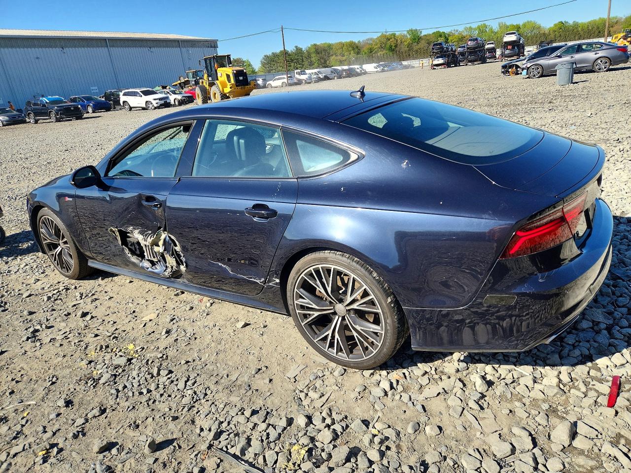 2016 Audi A7 VIN WAU2GAFC9GN004490 photo 2