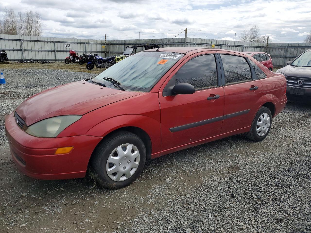 2004 Ford Focus VIN 1FAFP33P14W132192 photo 1
