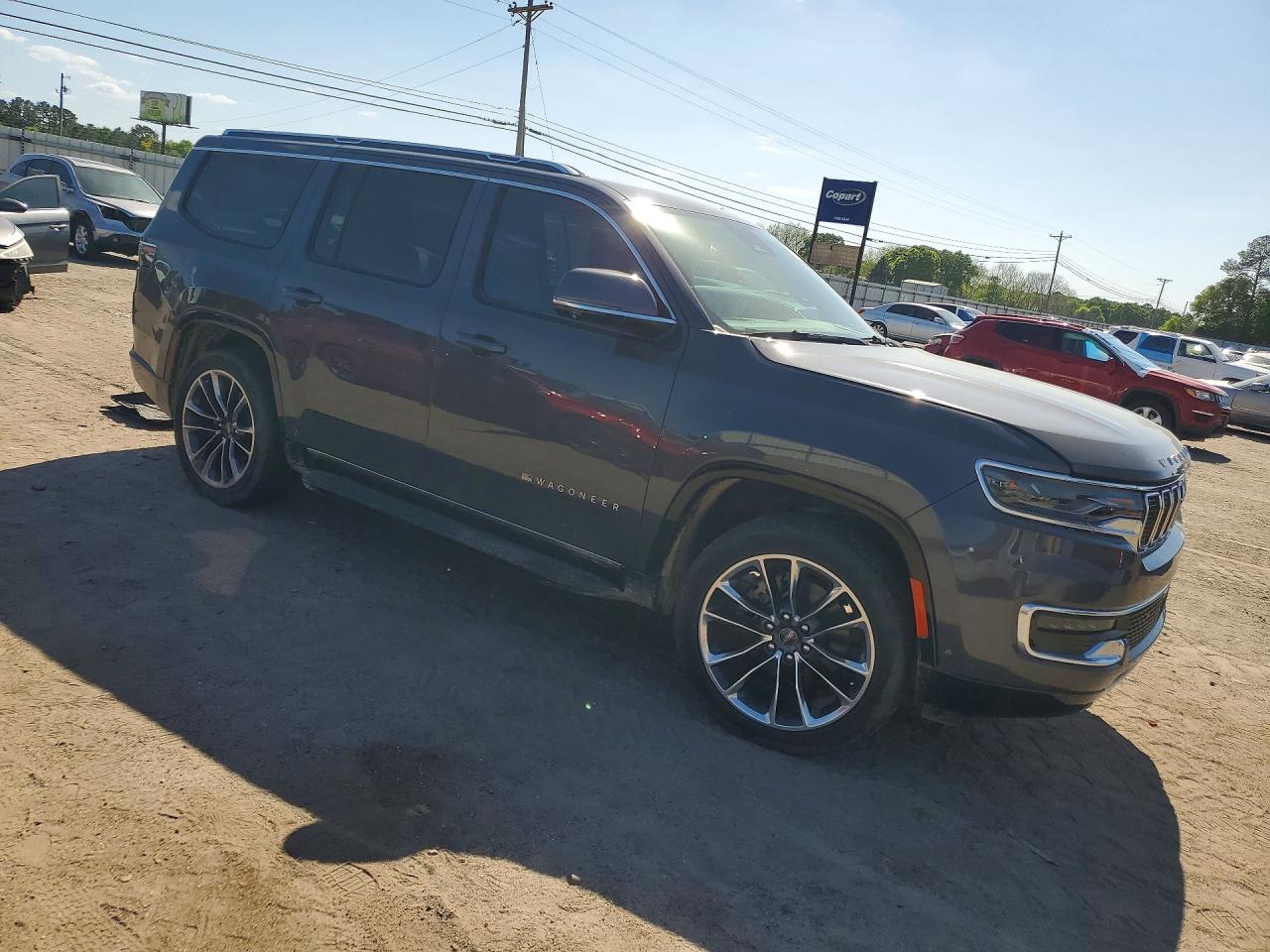 2022 Jeep Wagoneer VIN 1C4SJUBTXNS109145 photo 4