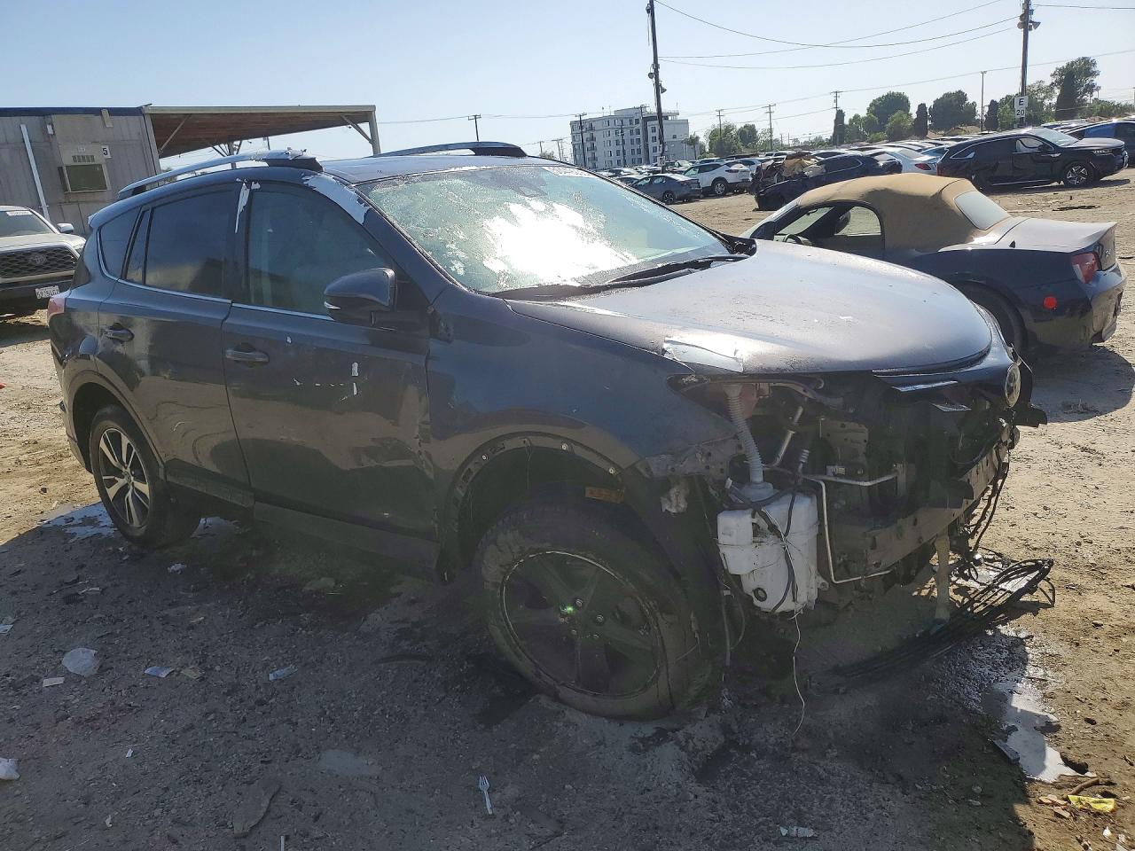2016 TOYT Rav4 VIN JTMWFREV9GJ092909 photo 4