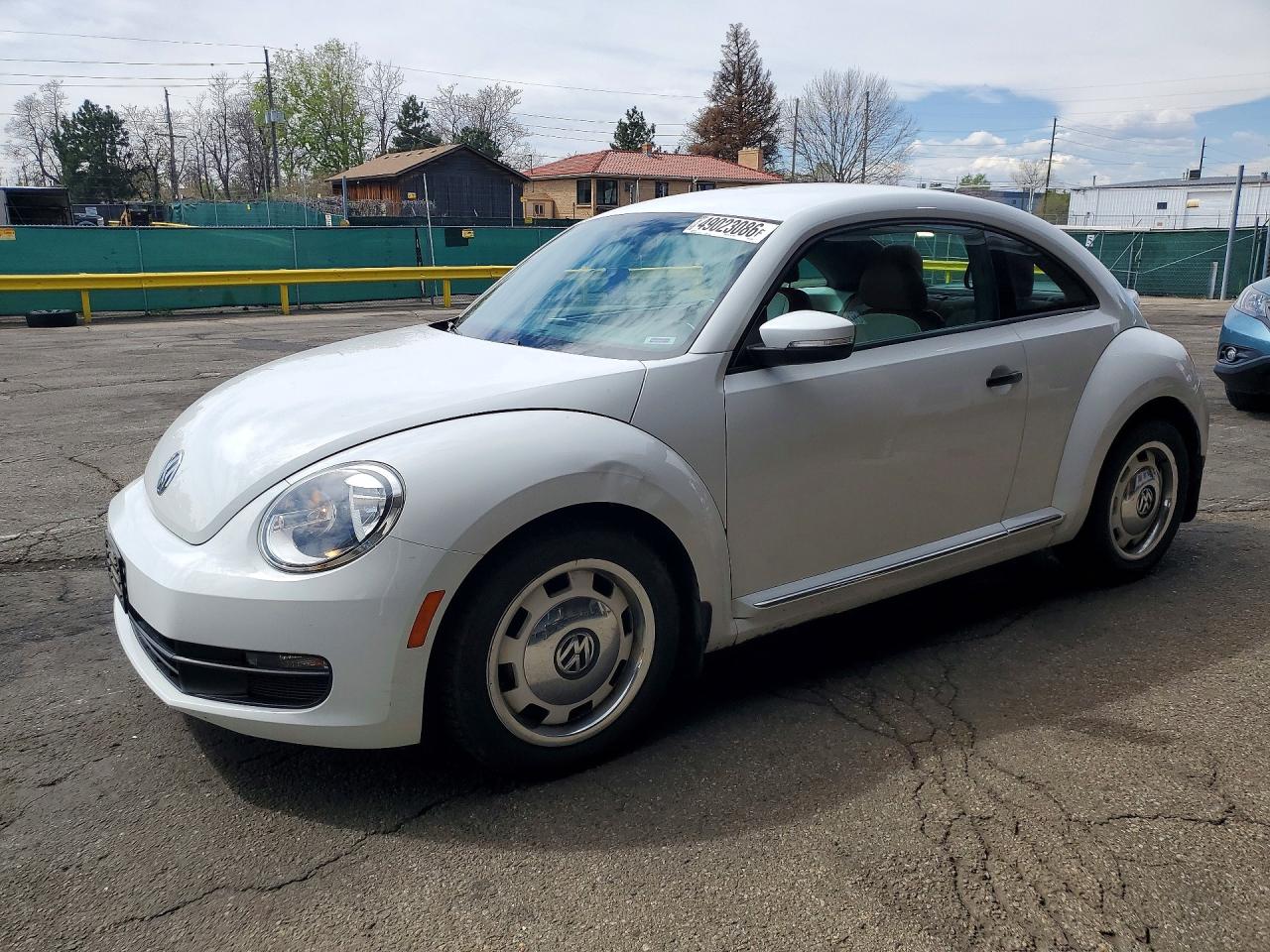 2016 Volkswagen Beetle VIN 3VWF17AT5GM627807 photo 1