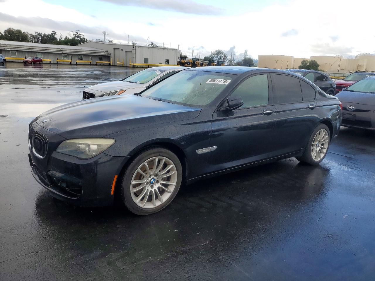 2011 BMW 7 series VIN WBAKA8C5XBCY36599 photo 1