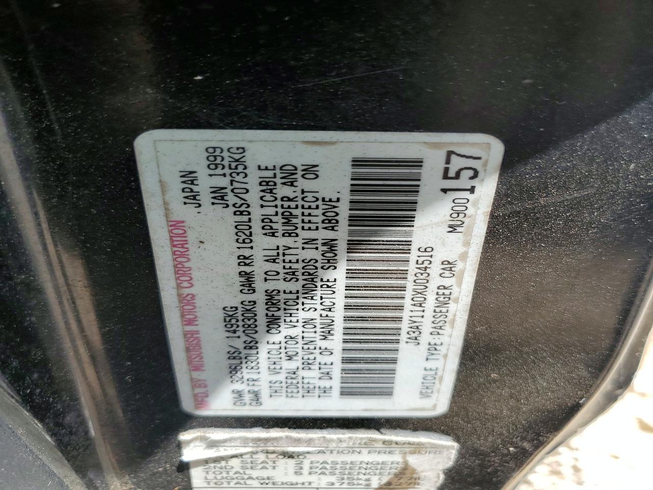 1999 Mitsubishi Mirage VIN JA3AY11A0XU034516 photo 12