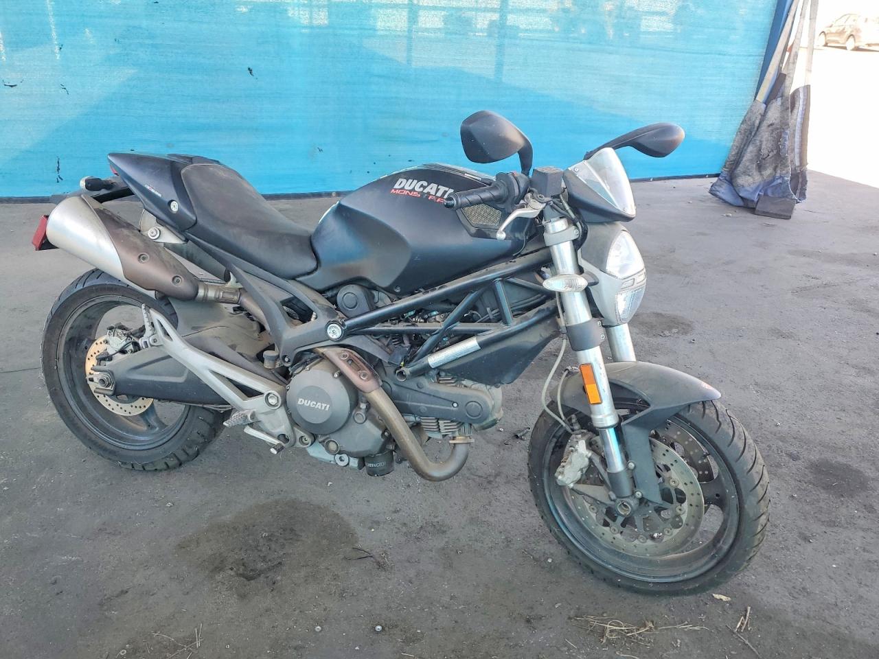 2011 Ducati Monster VIN ZDM1RADN7BB040593 photo 1