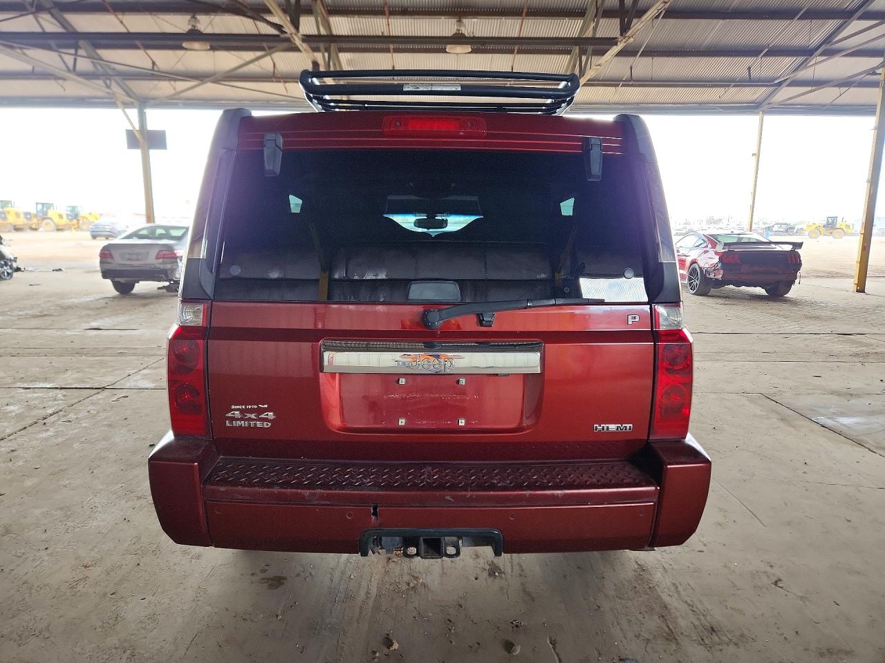 2007 Jeep Commander VIN 1J8HG58207C530195 photo 6