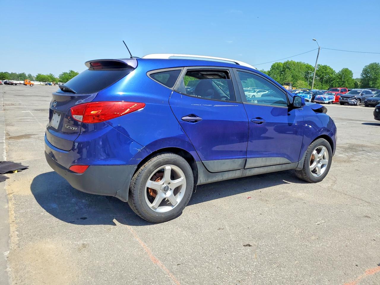 2011 Hyundai Tucson VIN KM8JU3AC0BU129124 photo 3