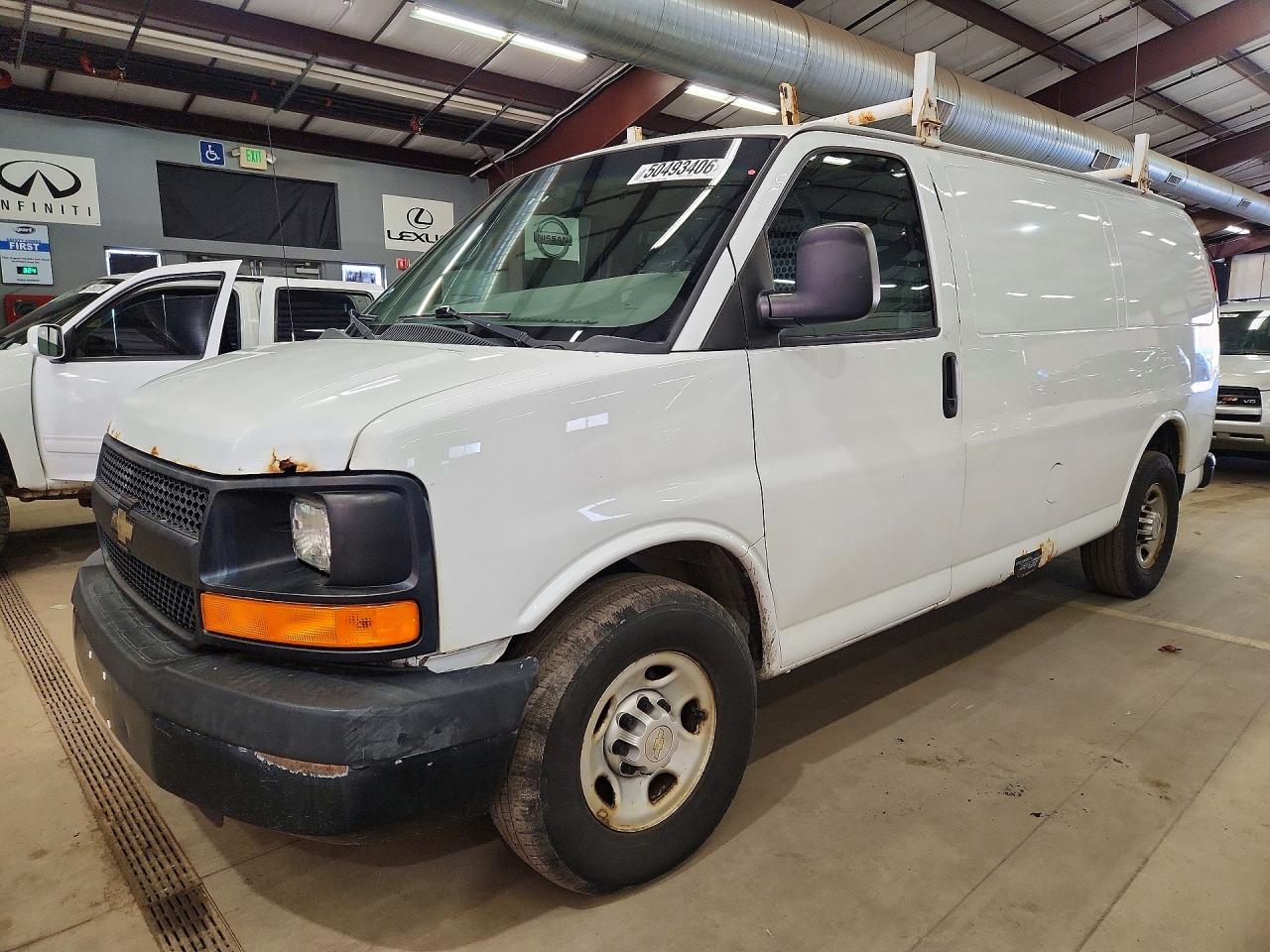 2014 CHEV Express VIN 1GCWGFCA4E1123119 photo 1