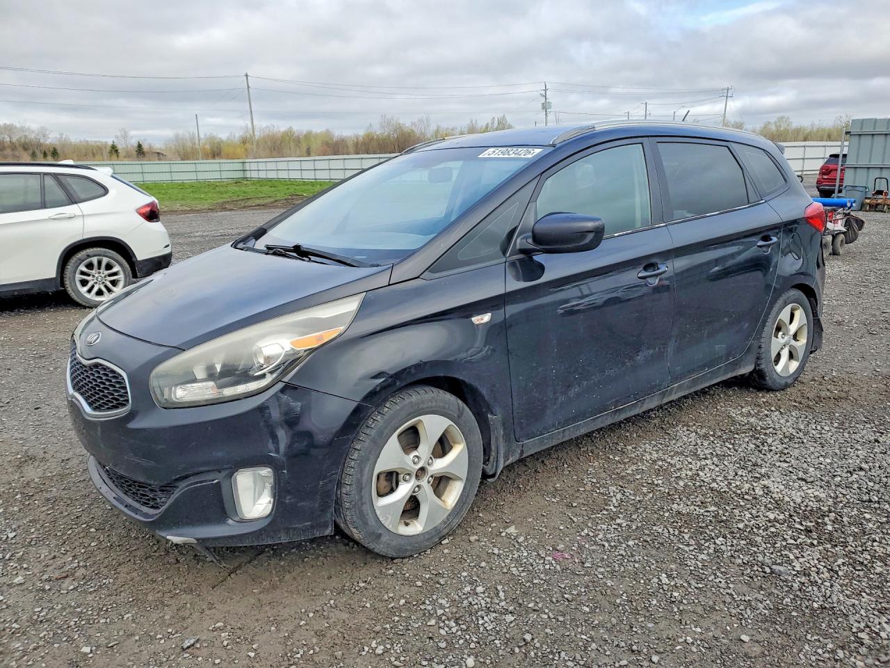 2014 Kia Rondo VIN KNAHT8A30E7059935 photo 1