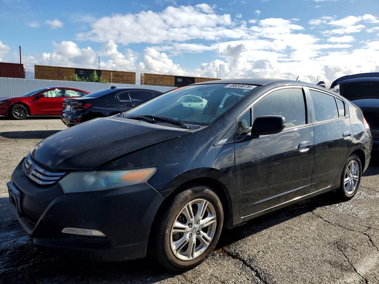2010 Honda Insight VIN JHMZE2H77AS022670 photo 1