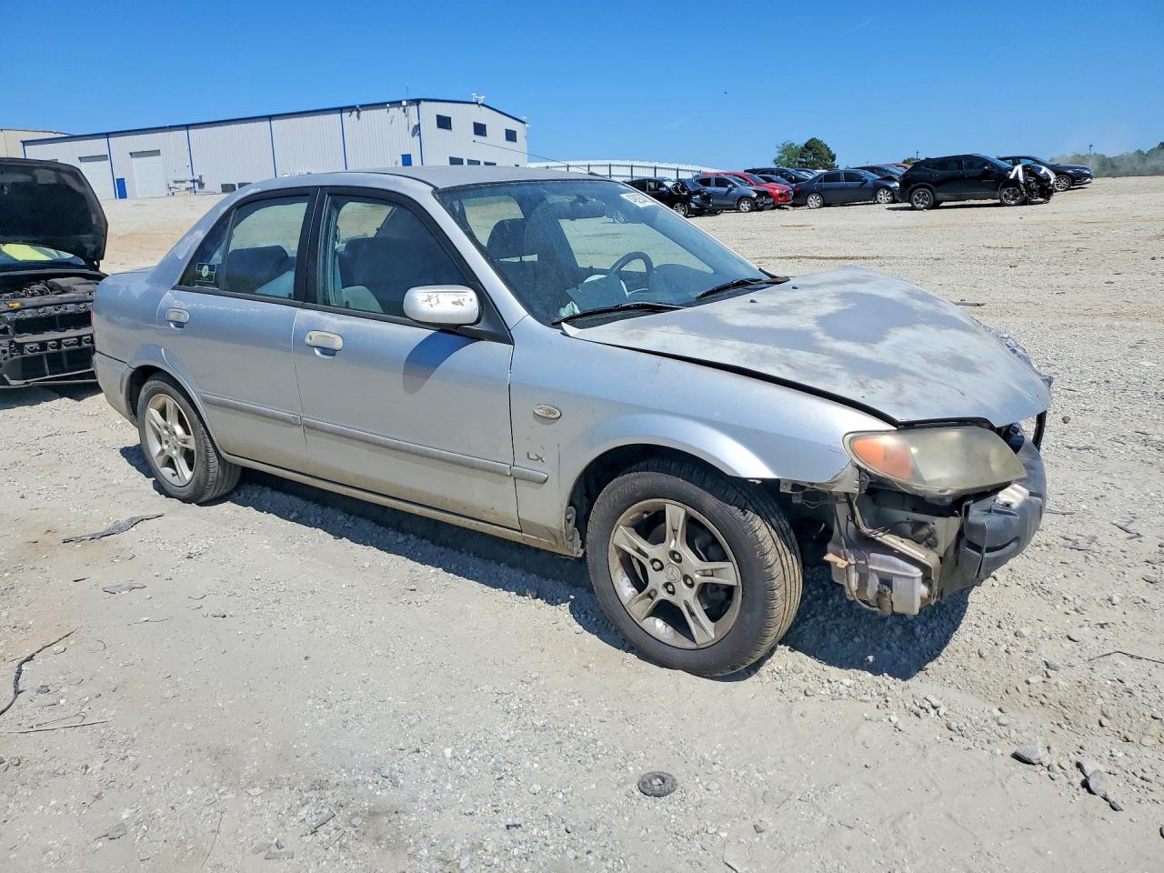 2003 Mazda Protege VIN JM1BJ225630107410 photo 4