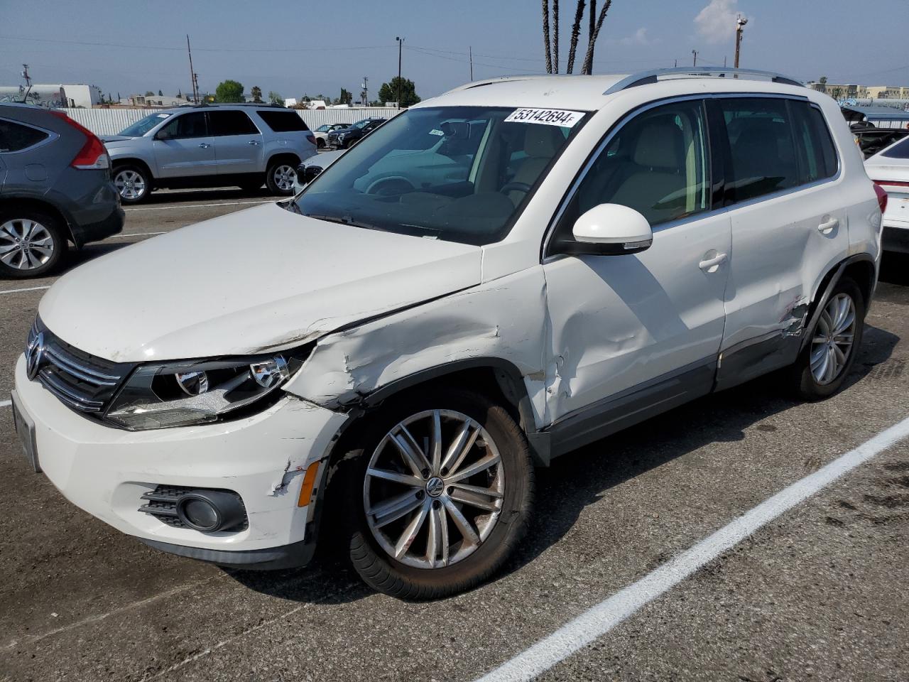 2012 Volkswagen Tiguan VIN WVGAV7AX2CW514505 photo 1