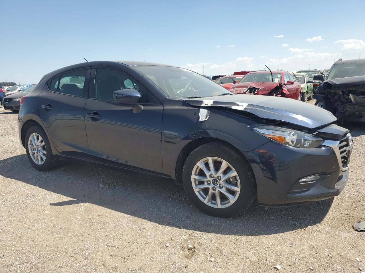 2017 Mazda 3 VIN 3MZBN1K70HM101975 photo 4