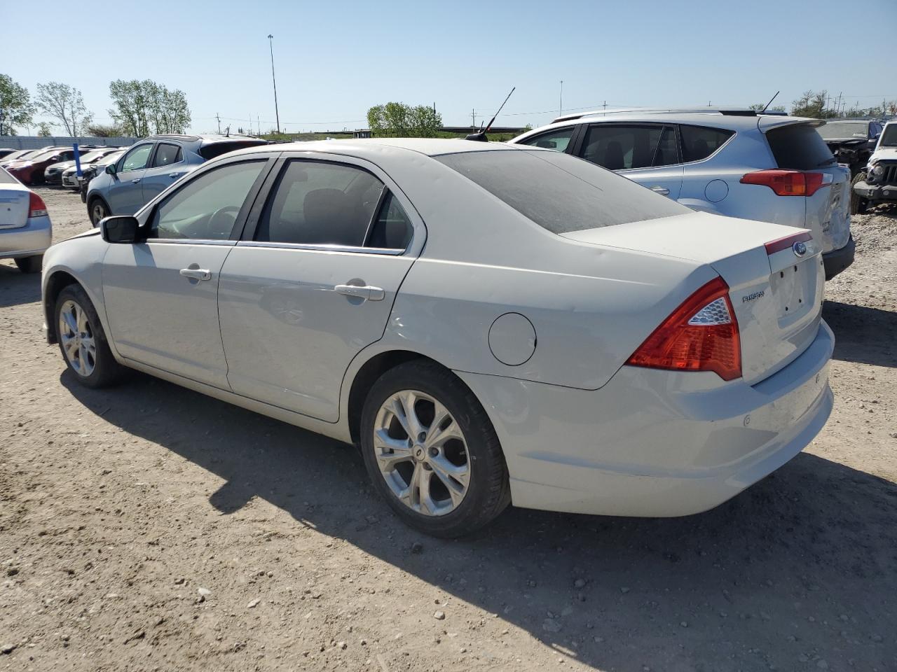 2012 Ford Fusion VIN 3FAHP0HA5CR107938 photo 2