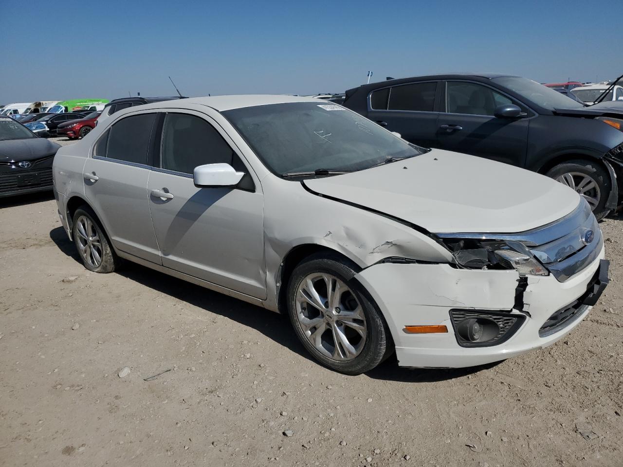 2012 Ford Fusion VIN 3FAHP0HA5CR107938 photo 4