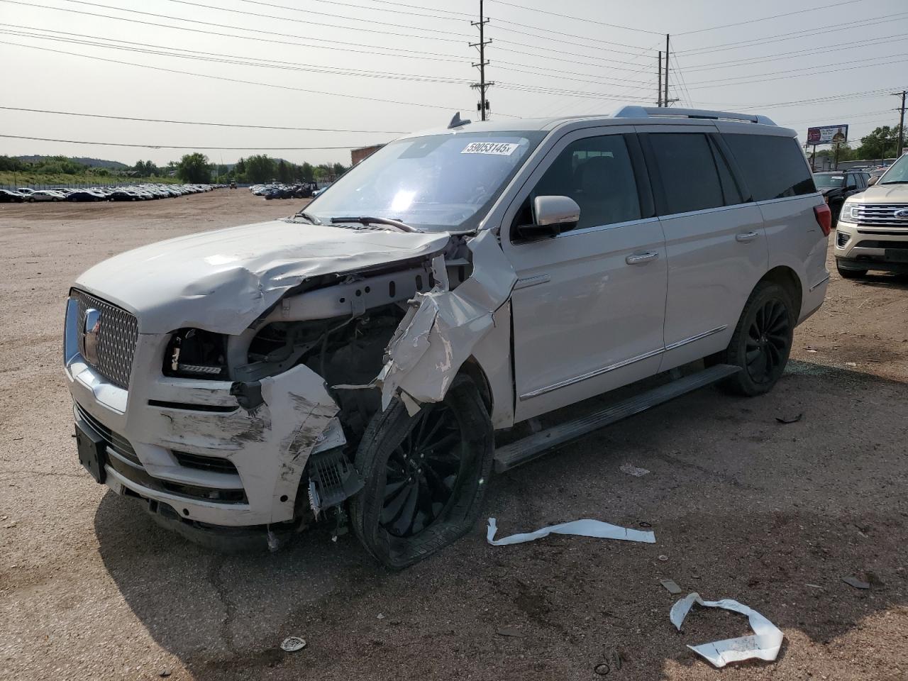2020 Lincoln Navigator VIN 5LMJJ2LT0LEL04125 photo 1