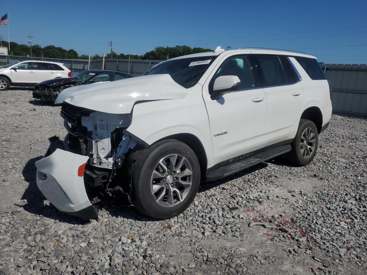 2022 CHEV Tahoe VIN 1GNSCNKDXNR365244 photo 1
