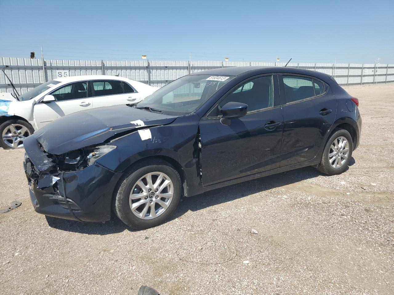 2017 Mazda 3 VIN 3MZBN1K70HM101975 photo 1