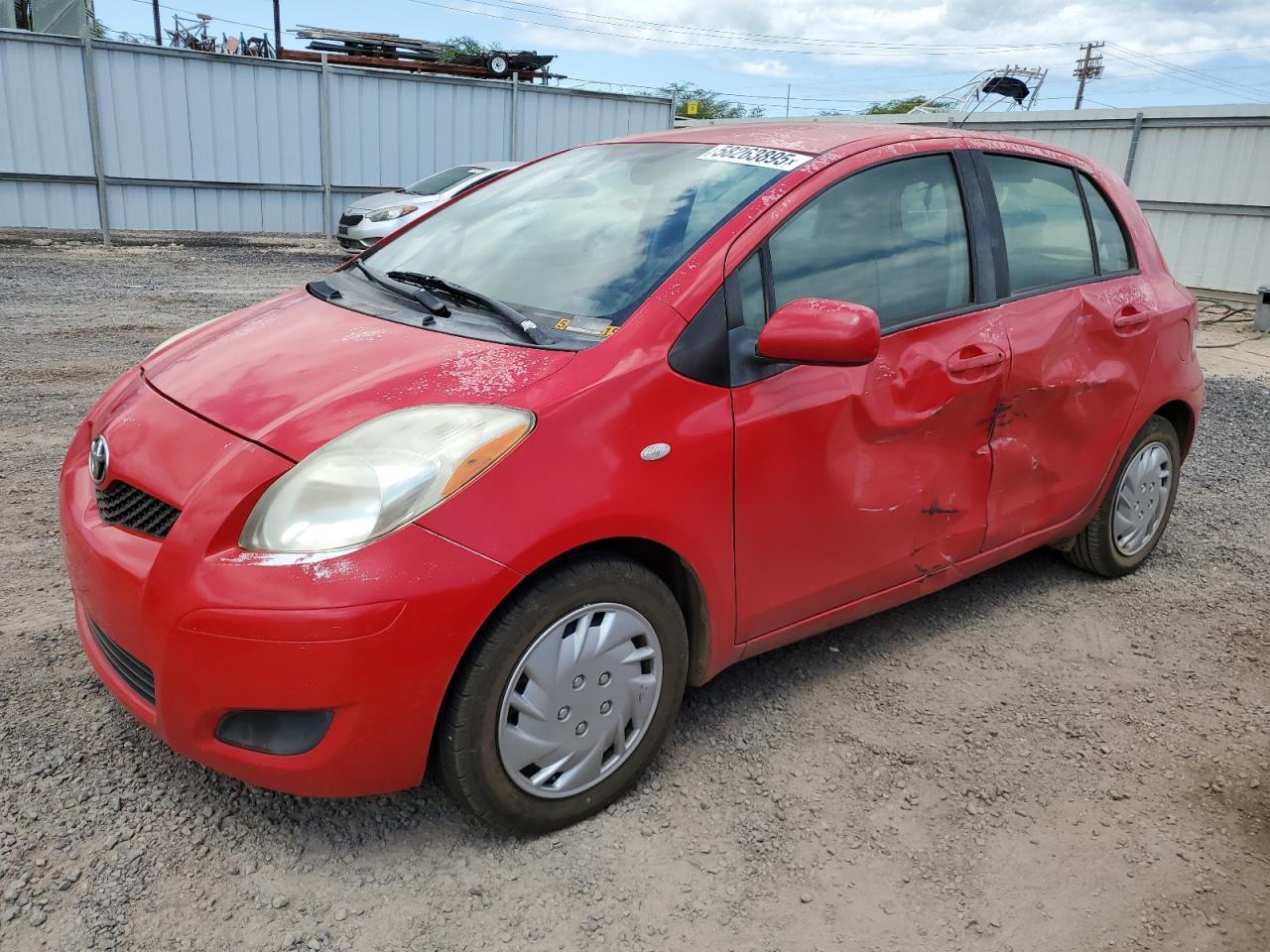 2011 Toyota Yaris VIN JTDKT4K34B5326646 photo 1