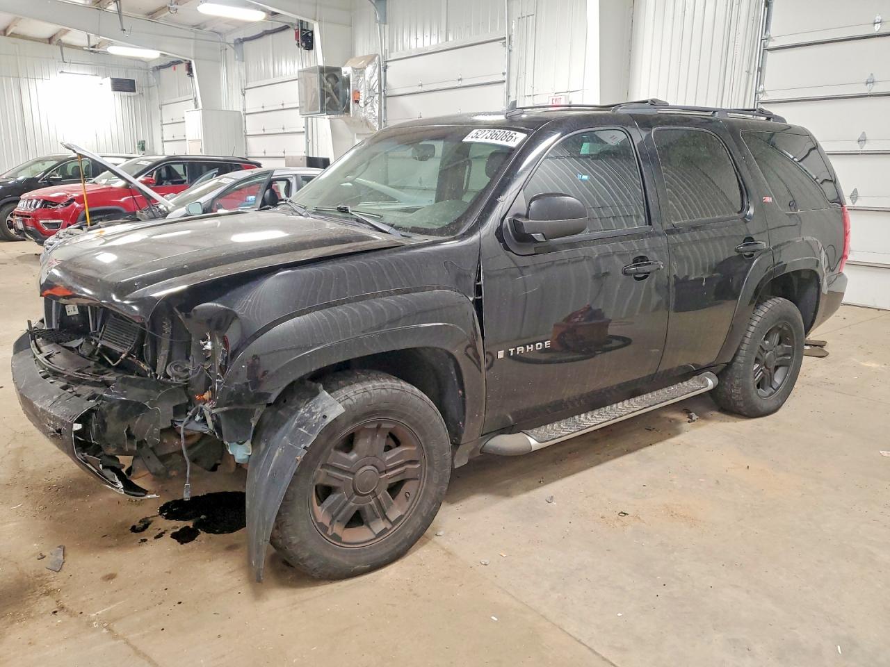 2009 Chevrolet Tahoe VIN 1GNFK23089R177150 photo 1