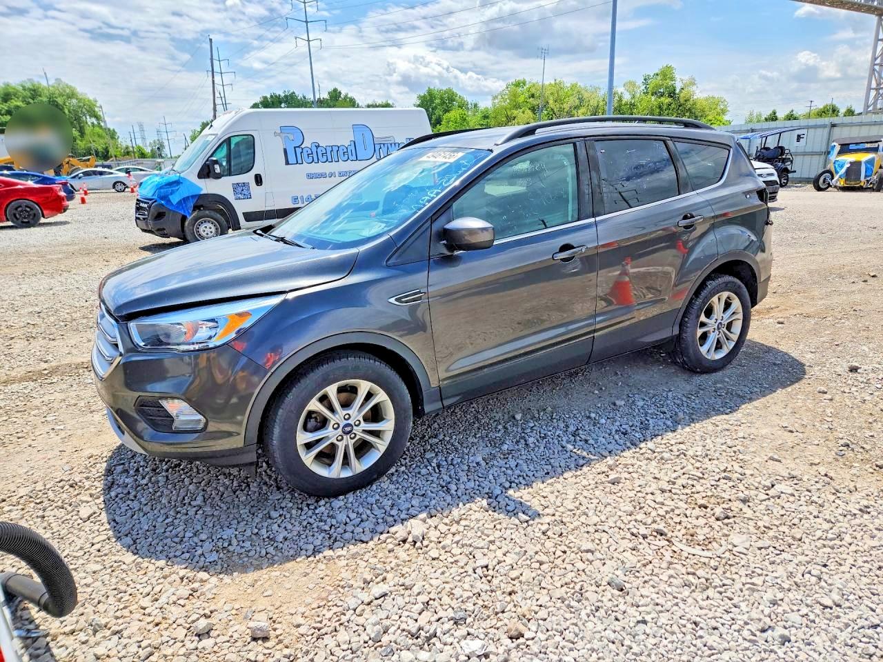 2018 Ford Escape VIN 1FMCU0GD6JUC57566 photo 1