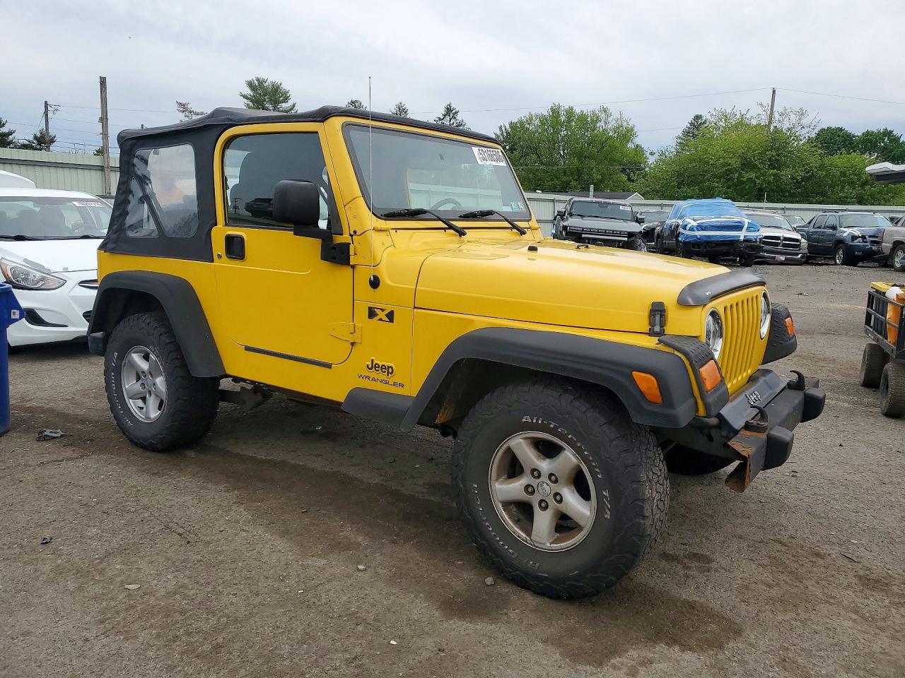 2004 Jeep Wrangler / VIN 1J4FA39S94P708574 photo 4