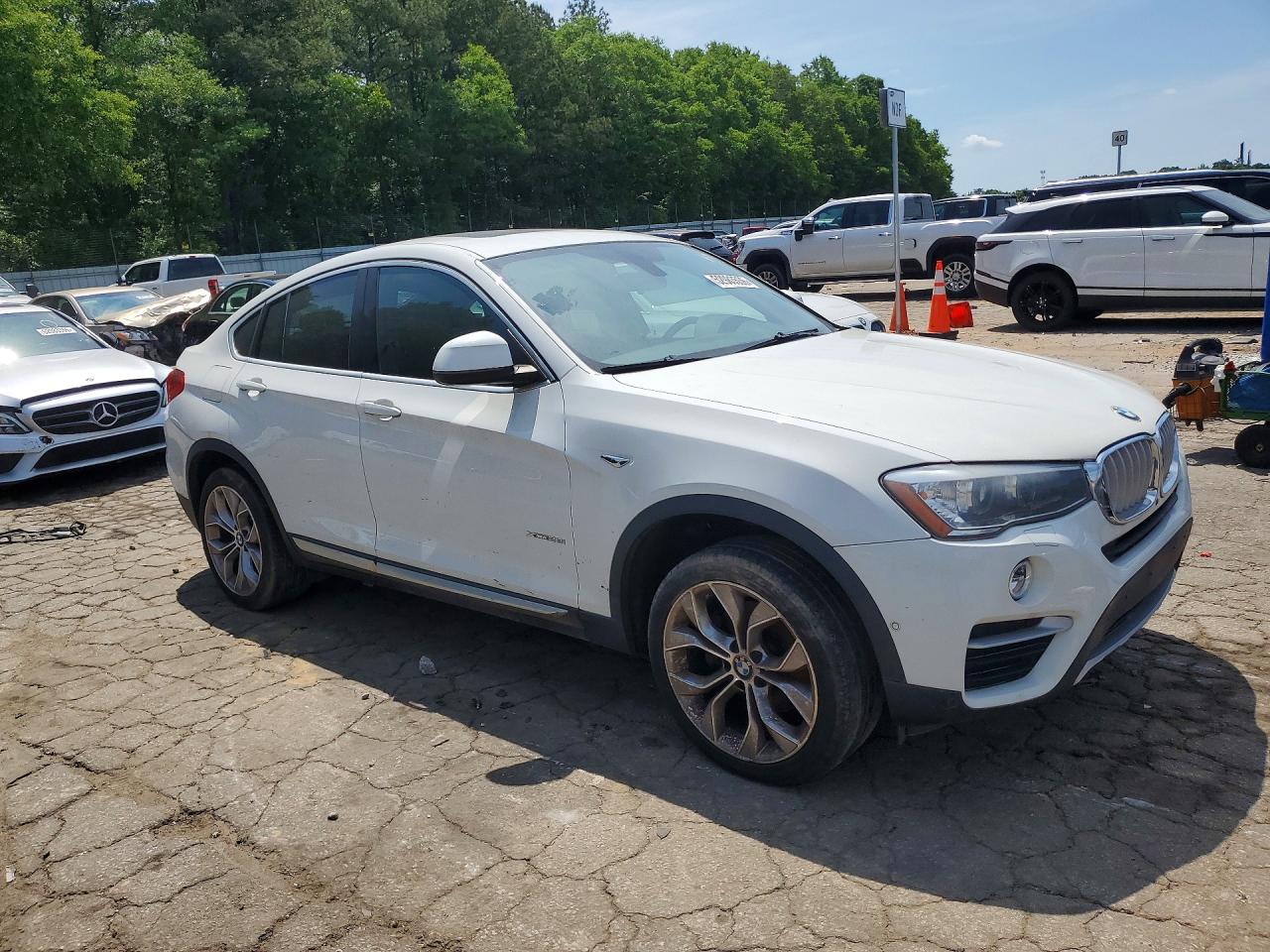 2018 BMW X4 VIN 5UXXW3C55J0Z60730 photo 4