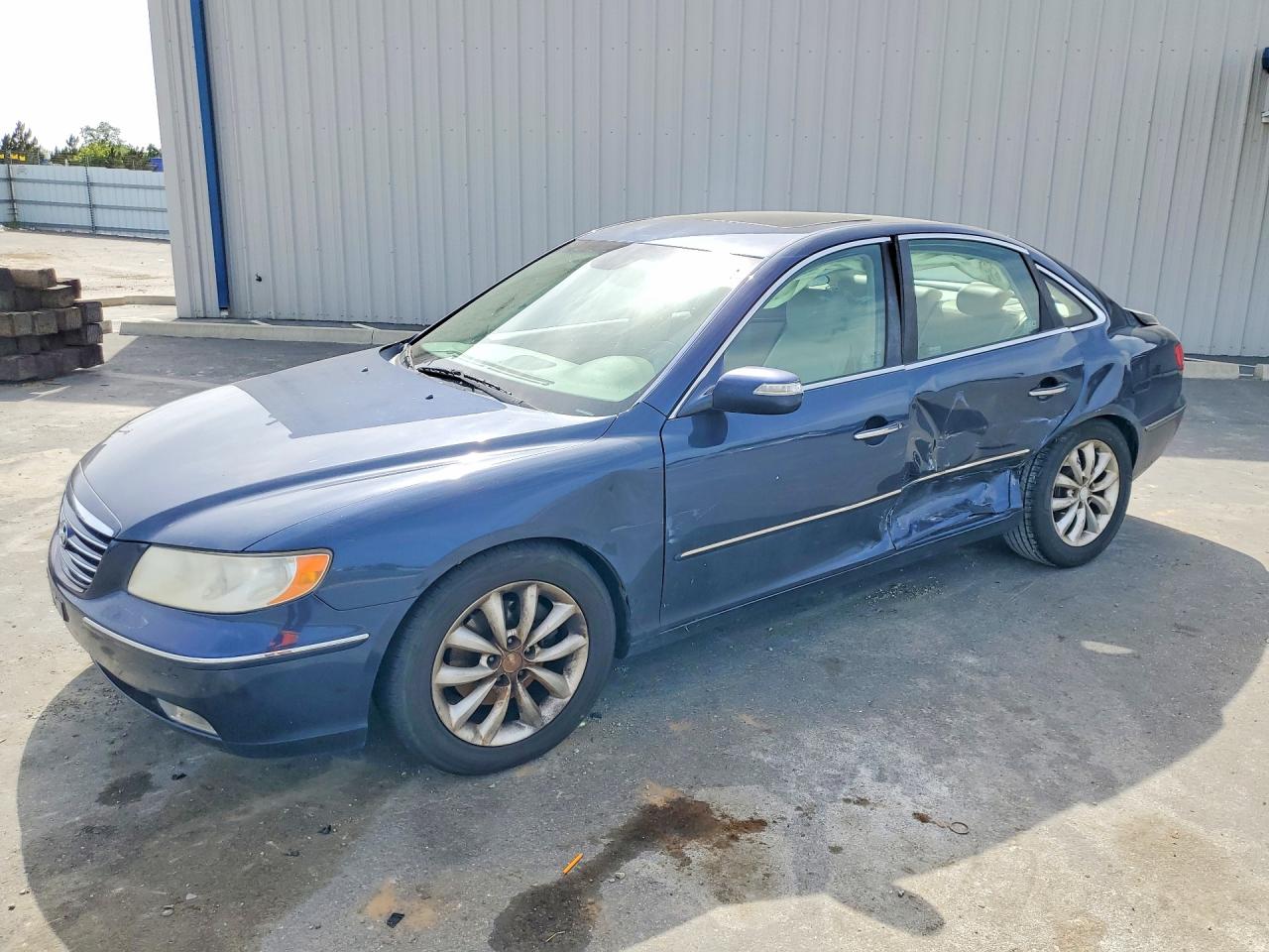 2007 Hyundai Azera VIN KMHFC46F97A180003 photo 1