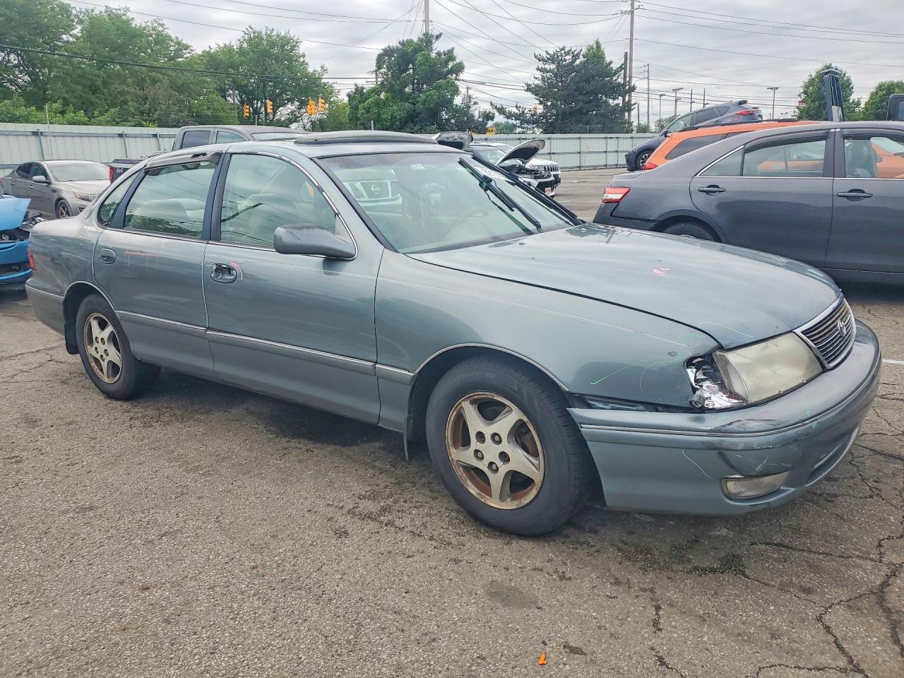 1999 Toyota Avalon VIN 4T1BF18B3XU322312 photo 4