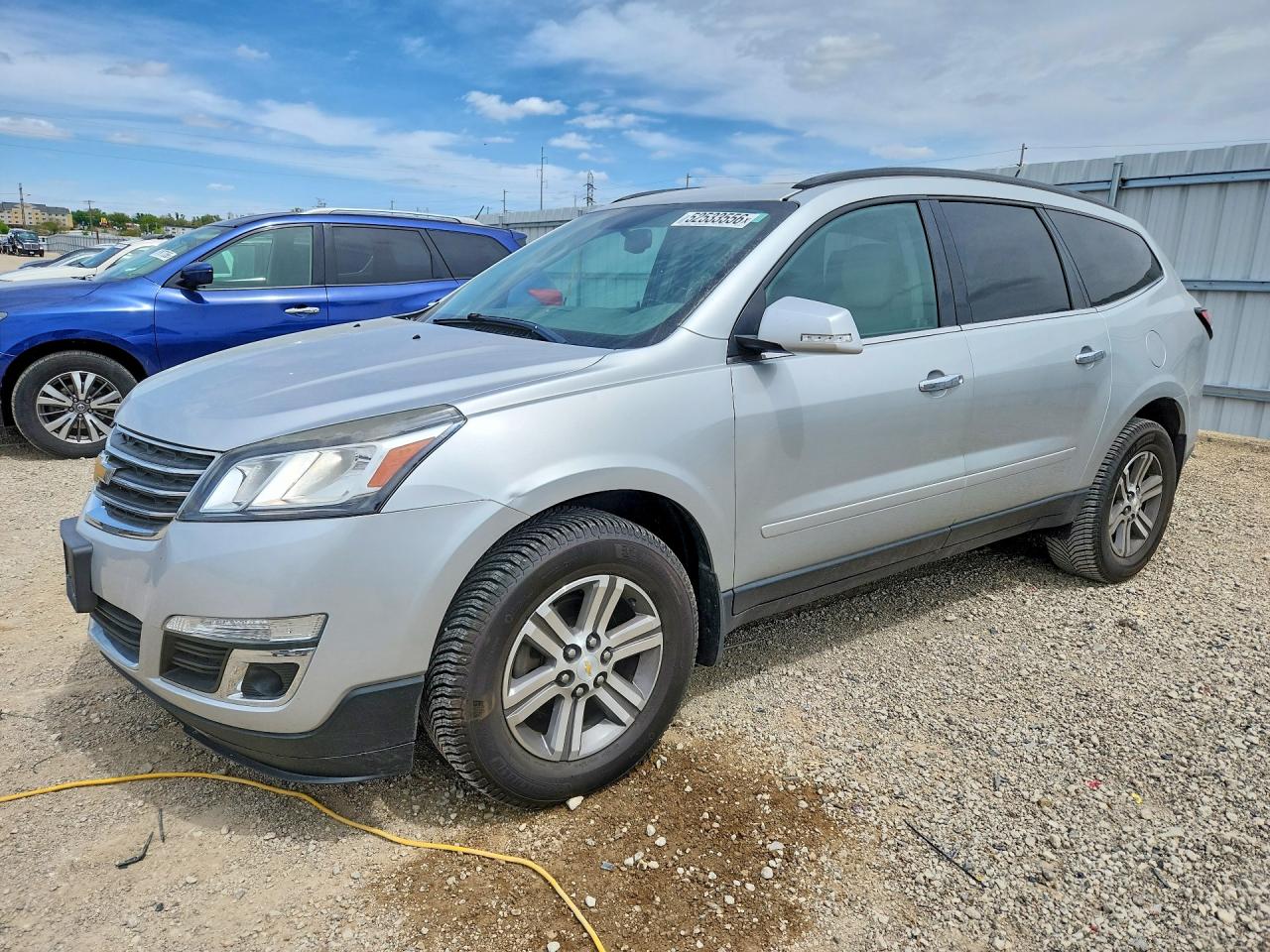 2015 Chevrolet Traverse VIN 1GNKVHKDXFJ287995 photo 1