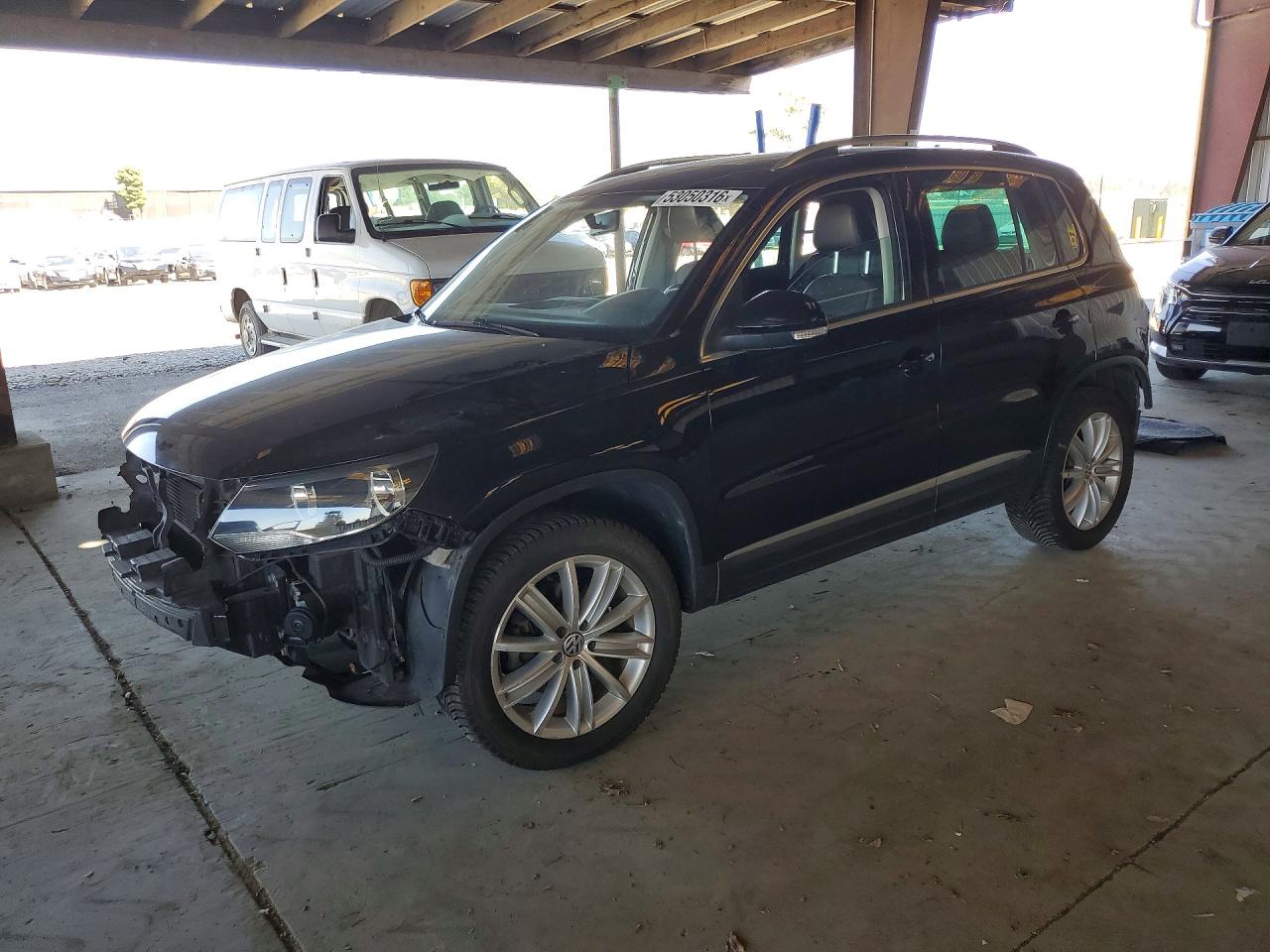 2014 Volkswagen Tiguan VIN WVGBV3AXXEW510864 photo 1