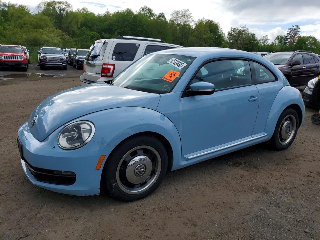 2013 Volkswagen Beetle VIN 3VWJP7AT7DM611080 photo 1