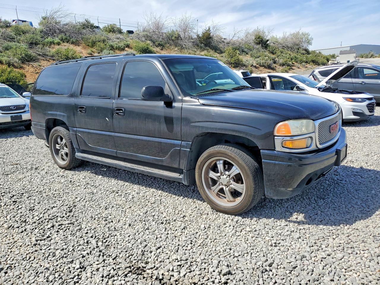 2001 GMC Denali VIN 1GKFK66U61J282176 photo 4