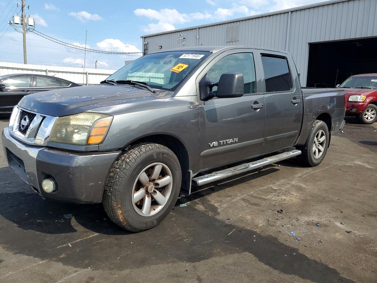 2010 Nissan TITAN VIN 1N6BA0ED3AN305205 photo 1
