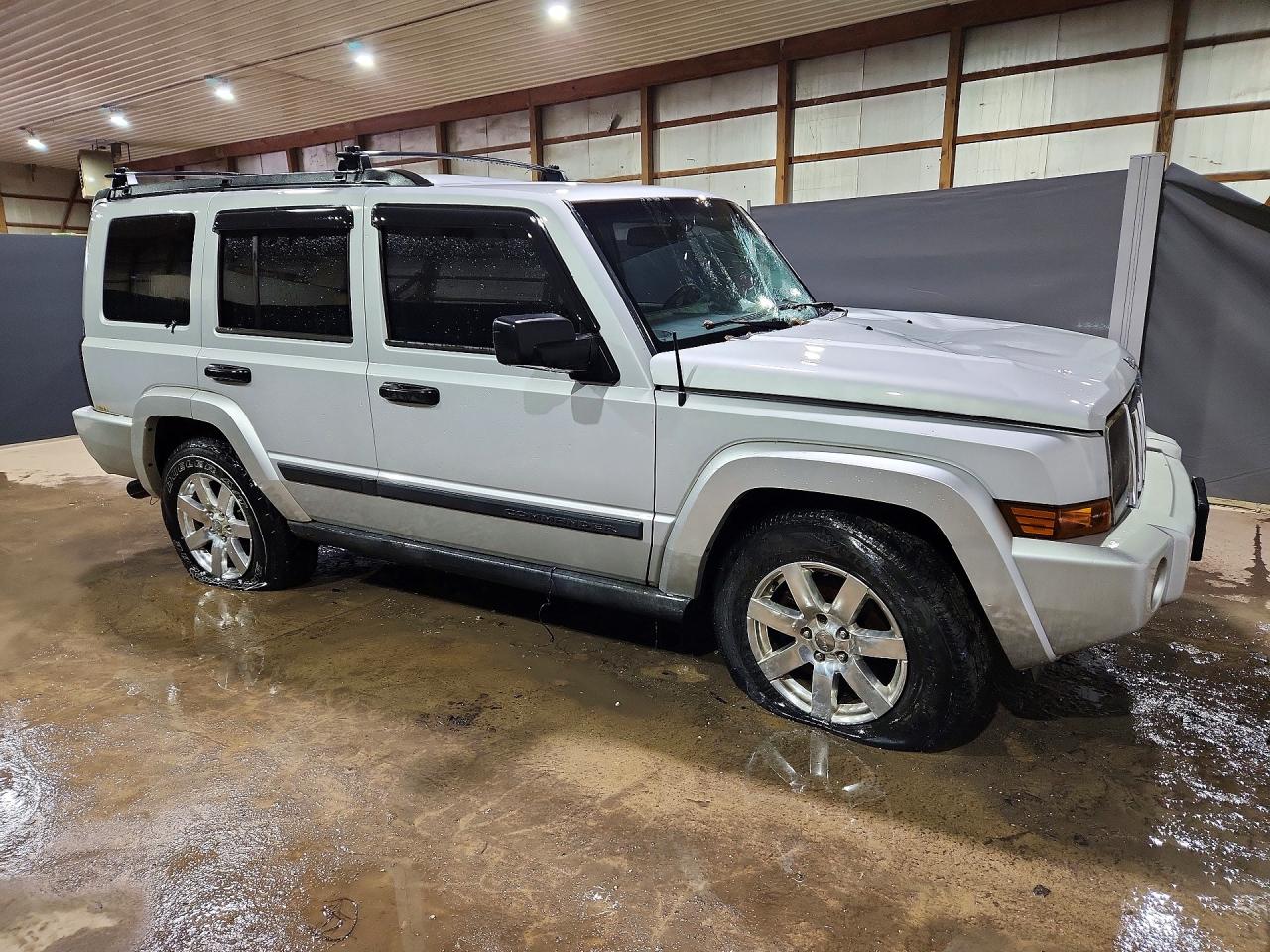 2006 Jeep Commander VIN 1J8HG48K76C162106 photo 4