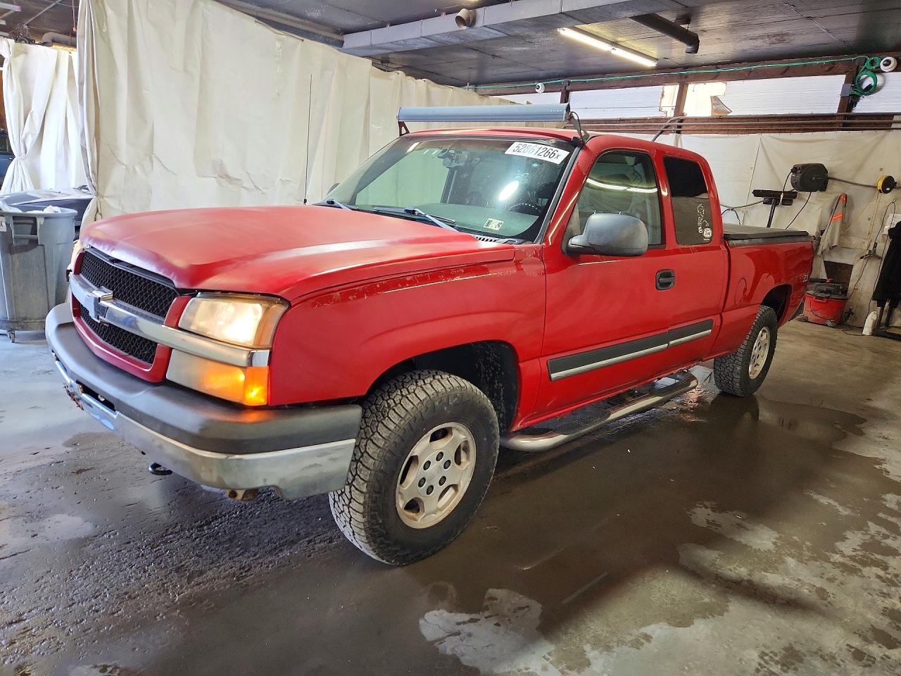 2003 Chevrolet Silverado VIN 2GCEK19V131228487 photo 1