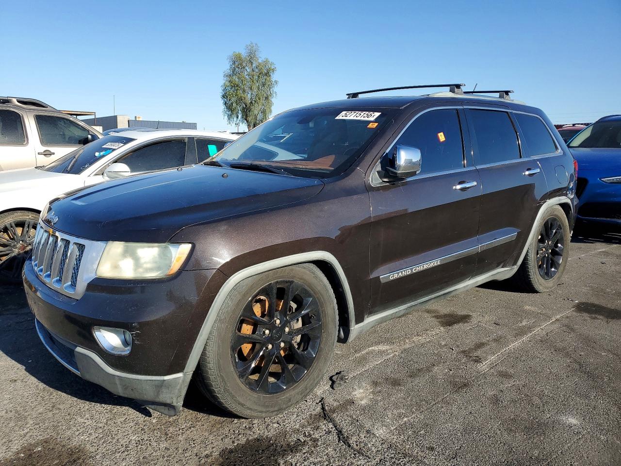 2011 Jeep Cherokee VIN 1J4RR6GT4BC672753 photo 1