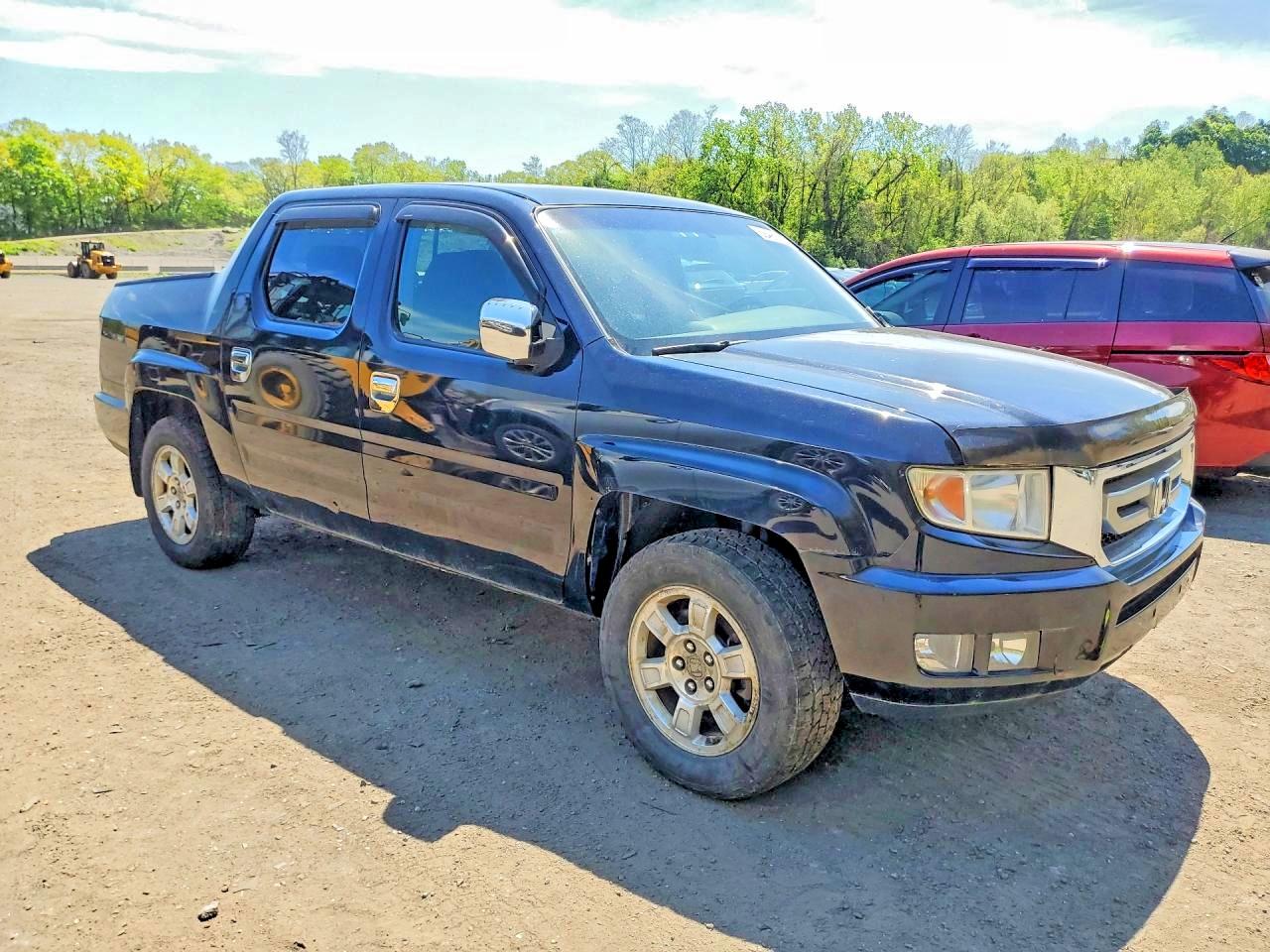 2011 Honda Ridgeline VIN 5FPYK1F48BB004242 photo 4