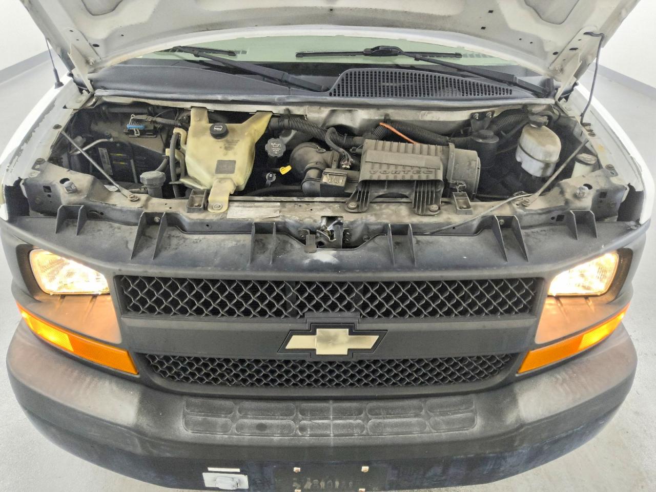 2011 CHEV Express VIN 1GCWGFCB6B1130139 photo 12